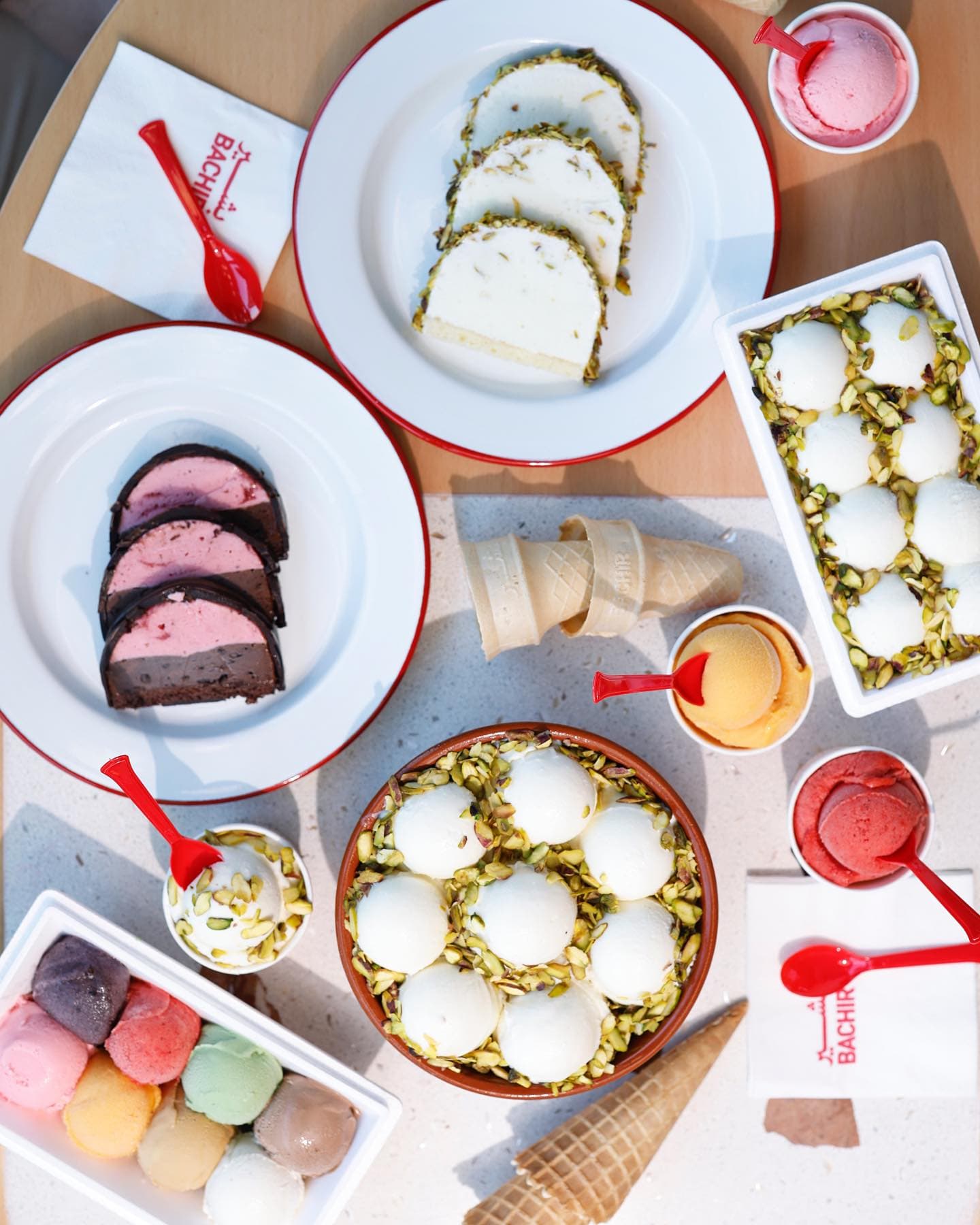 Full spread of Bachir Ice Cream products including Fekhara Ashta, ice cream cakes, scoops and cones